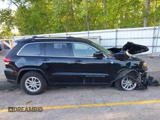 2020 Jeep Grand Cherokee Laredo with VIN 1C4RJFAG4LC292533, listed as a IAAI auction lot 42338468 with 49,061 mi miles and . Bid and sale history available at DreamBid. Image 13.