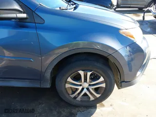 2014 Toyota RAV4 LE with VIN JTMZFREVXED029505, listed as a IAAI auction lot 40916384 with 142,408 mi miles. Bid and sale history available at carsss.com. Image 19.