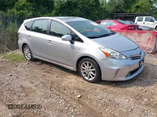 2014 Toyota Prius Two z VIN JTDZN3EU9EJ008007, wystawiony jako IAAI lot #42409806 z przebiegiem 170 891 mil mil oraz . Historia ofert i sprzedaży dostępna na DreamBid. Obrazek 1.