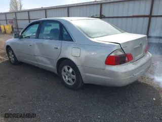 2003 Toyota Avalon XL with VIN 4T1BF28B43U305633, listed as a IAAI auction lot 42033322 with 246,802 mi miles. Bid and sale history available at carsss.com. Image 3.