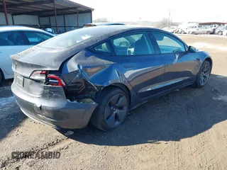 2023 Tesla Model 3 with VIN 5YJ3E1EA9PF548502, listed as a IAAI auction lot 41160649 with 28,759 mi miles and . Bid and sale history available at carsss.com. Image 4.