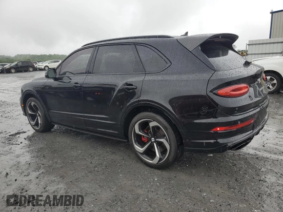2022 Bentley Bentayga V8 z VIN SJAAM2ZV8NC039607, wystawiony jako Copart lot #54888564 z przebiegiem 15 561 mil mil oraz . Historia ofert i sprzedaży dostępna na DreamBid. Obrazek 2.