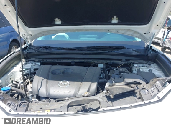 2021 Mazda CX-30 Select with VIN 3MVDMBBL9MM313039, listed as a IAAI auction lot 42575424 with 21,083 mi miles and . Bid and sale history available at DreamBid. Image 10.