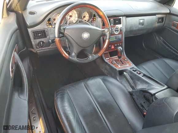 2001 Mercedes-Benz SLK-Class with VIN WDBKK65F31F230678, listed as a Copart auction lot 84119664 with 94,941 mi miles and Salvage Title. Bid and sale history available at carsss.com. Image 8.
