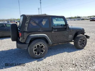 2014 Jeep Wrangler Sport with VIN 1C4AJWAG5EL192554, listed as a Copart auction lot 52501535 with 117,038 mi miles and Salvage Title. Bid and sale history available at carsss.com. Image 3.