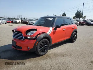 2012 MINI Countryman with VIN WMWZB3C59CWM06478, listed as a Copart auction lot 62547305 with 84,008 mi miles and Salvage title. Bid and sale history available at DreamBid. Image 1.