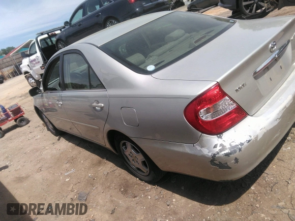 2003 Toyota Camry LE z VIN 4T1BF32K73U040558, wystawiony jako IAAI lot #42092091 z przebiegiem 179 949 mil mil oraz . Historia ofert i sprzedaży dostępna na DreamBid. Obrazek 3.