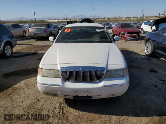 2000 Mercury Grand Marquis LS z VIN 2MEFM75W7YX626483, wystawiony jako Copart lot #54868355 z przebiegiem 233 985 mil mil oraz Tytuł czysty. Historia ofert i sprzedaży dostępna na DreamBid. Obrazek 5.