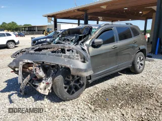 2015 Jeep Cherokee Trailhawk z VIN 1C4PJMBSXFW618935, wystawiony jako Copart lot #58027385 z przebiegiem Nie podano mil oraz Szkoda całkowita • Salvage title. Historia ofert i sprzedaży dostępna na DreamBid. Obrazek 1.