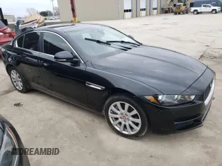 2019 Jaguar XE 25t with VIN SAJAS4FX1KCP49077, listed as a Copart auction lot 87104284 with 124,857 mi miles and Clean Title. Bid and sale history available at carsss.com. Image 4.