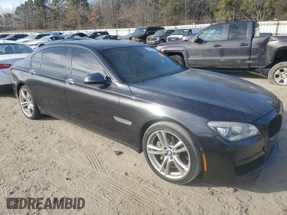 2015 BMW 7 Series 750Li with VIN WBAYE8C59FD780945, listed as a Copart auction lot 42730625 with 0 mi miles and Salvage Title. Bid and sale history available at carsss.com. Image 4.