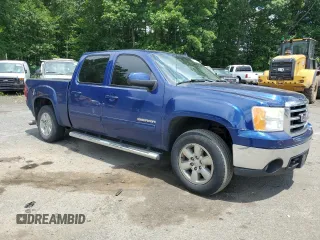 2013 GMC Sierra 1500 SLT with VIN 3GTP2WE77DG161822, listed as a Copart auction lot 63851855 with 169,146 mi miles and Salvage title. Bid and sale history available at DreamBid. Image 4.