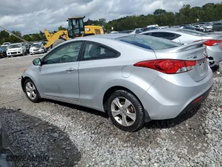 2013 Hyundai Elantra Coupe GS PZEV with VIN KMHDH6AE2DU023460, listed as a Copart auction lot 71382144 with 124,578 mi miles and Salvage Title. Bid and sale history available at carsss.com. Image 2.