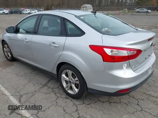 2014 Ford Focus SE with VIN 1FADP3F24EL285126, listed as a IAAI auction lot 41956143 with 113,415 mi miles. Bid and sale history available at carsss.com. Image 3.