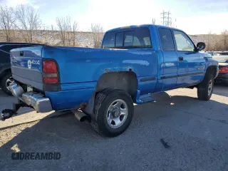 1999 Dodge Ram 2500 with VIN 1B7KF23Z0XJ641988, listed as a Copart auction lot 84740714 with 147,277 mi miles and Clean Title. Bid and sale history available at carsss.com. Image 3.