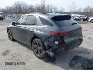 2022 Genesis GV70 Sport with VIN KMUMCDTC6NU028274, listed as a IAAI auction lot 41613720 with 46,522 mi miles and . Bid and sale history available at DreamBid. Image 3.