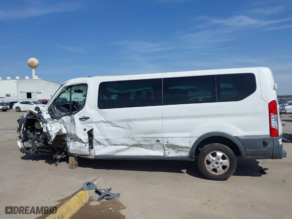 2018 Ford Transit Passenger Wagon XL with VIN 1FBZX2YM0JKA87639, listed as a IAAI auction lot 38957868 with 1 mi miles. Bid and sale history available at carsss.com. Image 14.