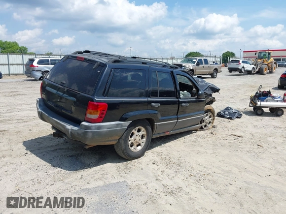 2000 Jeep Grand Cherokee Laredo with VIN 1J4G248SXYC365442, listed as a IAAI auction lot 42285521 with Not provided miles and . Bid and sale history available at DreamBid. Image 4.