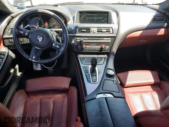2015 BMW 6 Series 640i xDrive z VIN WBA6B8C53FD453909, wystawiony jako Copart lot #55292765 z przebiegiem 84 971 mil mil oraz Szkoda całkowita • Salvage title. Historia ofert i sprzedaży dostępna na DreamBid. Obrazek 8.