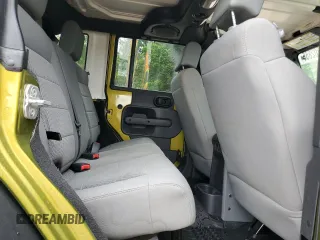 2008 Jeep Wrangler Rubicon z VIN 1J8GA69138L533859, wystawiony jako Copart lot #54202865 z przebiegiem 75 742 mil mil oraz Szkoda całkowita • Salvage title. Historia ofert i sprzedaży dostępna na DreamBid. Obrazek 11.