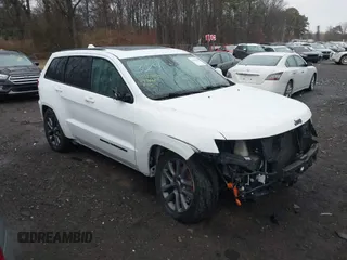 2019 Jeep Grand Cherokee High Altitude with VIN 1C4RJFCT8KC785351, listed as a IAAI auction lot 41918878 with 85,495 mi miles and . Bid and sale history available at DreamBid. Image 1.