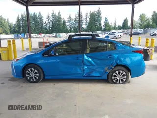 2020 Toyota Prius LE with VIN JTDL9RFU5L3018787, listed as a IAAI auction lot 42723431 with 30,793 mi miles and . Bid and sale history available at DreamBid. Image 14.