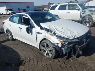 2019 Kia Optima LX with VIN 5XXGT4L31KG347762, listed as a IAAI auction lot 41533519 with 59,720 mi miles. Bid and sale history available at carsss.com. Image 1.