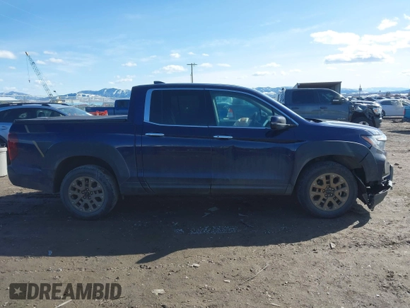 2022 Honda Ridgeline RTL-E with VIN 5FPYK3F71NB013522, listed as a IAAI auction lot 41670347 with 24,689 mi miles and . Bid and sale history available at DreamBid. Image 13.