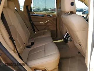 2014 Porsche Cayenne z VIN WP1AA2A28ELA91097, wystawiony jako Copart lot #57812585 z przebiegiem 115 596 mil mil oraz Szkoda całkowita • Salvage title. Historia ofert i sprzedaży dostępna na DreamBid. Obrazek 11.