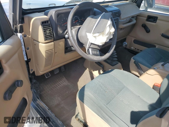 2001 Jeep Wrangler Sahara with VIN 1J4FA59S71P343366, listed as a Copart auction lot 57826405 with 156,436 mi miles and Salvage title. Bid and sale history available at DreamBid. Image 8.