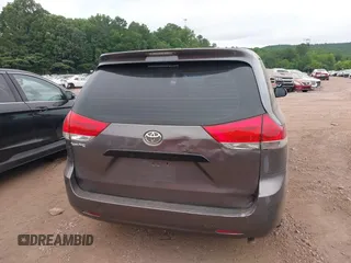 2014 Toyota Sienna L with VIN 5TDZK3DC8ES470837, listed as a IAAI auction lot 42426844 with 302,661 mi miles and . Bid and sale history available at DreamBid. Image 16.
