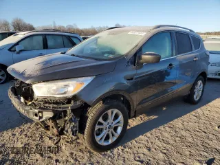 2018 Ford Escape SE z VIN 1FMCU9GD7JUA19262, wystawiony jako Copart lot #84627944 z przebiegiem 89 993 mil mil oraz Szkody całkowita. Historia ofert i sprzedaży dostępna na DreamBid. Obrazek 1.