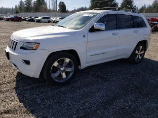 2014 Jeep Grand Cherokee Overland with VIN 1C4RJFCM6EC555482, listed as a Copart auction lot 47474075 with 158,015 mi miles and Salvage Title. Bid and sale history available at carsss.com. Image 1.