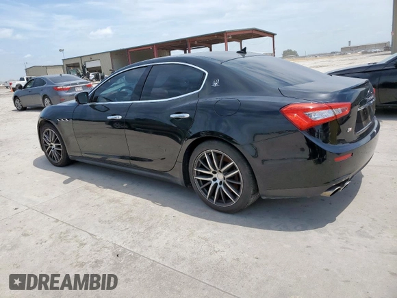 2014 Maserati Ghibli S Q4 with VIN ZAM57RTA8E1097777, listed as a Copart auction lot 59604665 with 86,135 mi miles and Salvage title. Bid and sale history available at DreamBid. Image 2.