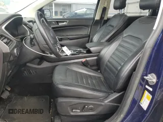 2016 Ford Edge SEL z VIN 2FMPK3J90GBB51657, wystawiony jako Copart lot #57895715 z przebiegiem 104 797 mil mil oraz Tytuł czysty. Historia ofert i sprzedaży dostępna na DreamBid. Obrazek 7.