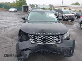 2018 Land Rover Range Rover Velar S z VIN SALYB2RVXJA769780, wystawiony jako IAAI lot #42309531 z przebiegiem 94 127 mil mil oraz . Historia ofert i sprzedaży dostępna na DreamBid. Obrazek 12.