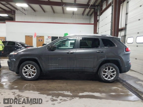 2014 Jeep Cherokee Latitude with VIN 1C4PJMCS0EW213826, listed as a IAAI auction lot 41322537 with 272,659 mi miles and . Bid and sale history available at DreamBid. Image 14.