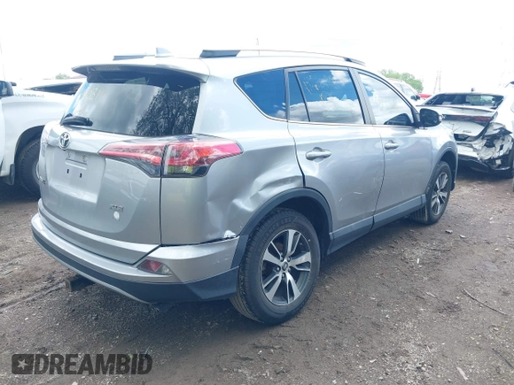 2018 Toyota RAV4 XLE z VIN 2T3WFREV1JW427878, wystawiony jako IAAI lot #42191031 z przebiegiem 97 264 mil mil oraz . Historia ofert i sprzedaży dostępna na DreamBid. Obrazek 4.