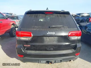 2014 Jeep Grand Cherokee Laredo with VIN 1C4RJEAG4EC136764, listed as a IAAI auction lot 41817676 with 133,943 mi miles. Bid and sale history available at carsss.com. Image 16.