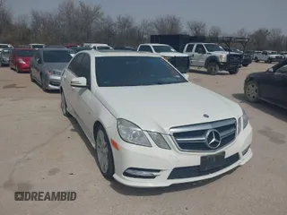 2012 Mercedes-Benz E-Class E 350 Luxury with VIN WDDHF8JB8CA518992, listed as a IAAI auction lot 41690066 with 208,153 mi miles. Bid and sale history available at carsss.com. Image 1.