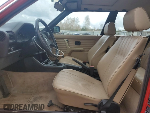 1989 BMW 3 Series z VIN WBAAB9303K8137272, wystawiony jako Copart lot #77381794 z przebiegiem 169 380 mil mil oraz Czysty tytuł • Clean title. Historia ofert i sprzedaży dostępna na DreamBid. Obrazek 7.