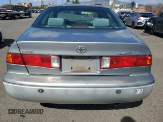 2001 Toyota Camry CE with VIN JT2BG22K610579827, listed as a Copart auction lot 41537605 with 188,136 mi miles and Salvage Title. Bid and sale history available at DreamBid. Image 6.