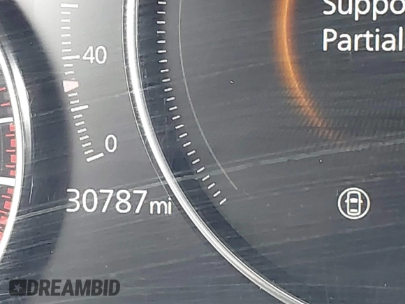 2022 Mazda 3 Carbon Edition z VIN 3MZBPACL7NM313242, wystawiony jako IAAI lot #42095279 z przebiegiem 30 787 mil mil oraz . Historia ofert i sprzedaży dostępna na DreamBid. Obrazek 15.