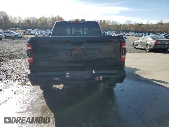 2019 Ram 1500 Rebel z VIN 1C6SRFET5KN580766, wystawiony jako Copart lot #54126805 z przebiegiem 129 515 mil mil oraz Szkoda całkowita • Salvage title. Historia ofert i sprzedaży dostępna na DreamBid. Obrazek 6.