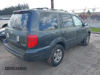 2005 Honda Pilot EX-L with VIN 2HKYF185X5H573585, listed as a IAAI auction lot 42094532 with 1 mi miles. Bid and sale history available at carsss.com. Image 4.