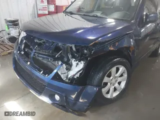 2012 Suzuki Grand Vitara Limited with VIN JS3TD0D76C4100790, listed as a IAAI auction lot 41716479 with 107,102 mi miles. Bid and sale history available at carsss.com. Image 6.