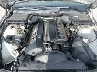 2000 BMW 5 Series 528iA with VIN WBADM6344YGU22084, listed as a IAAI auction lot 41734099 with 249,650 mi miles. Bid and sale history available at carsss.com. Image 10.
