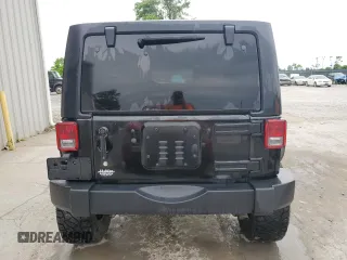 2014 Jeep Wrangler Unlimited Rubicon X with VIN 1C4HJWFG0EL142071, listed as a Copart auction lot 56187575 with 110,597 mi miles and Salvage title. Bid and sale history available at DreamBid. Image 6.