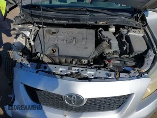 2009 Toyota Corolla with VIN JTDBL40E999021621, listed as a IAAI auction lot 41636462 with 123,650 mi miles. Bid and sale history available at carsss.com. Image 10.