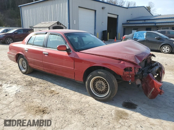2001 Ford Crown Victoria LX z VIN 2FAFP74W41X205147, wystawiony jako Copart lot #46240035 z przebiegiem 65 495 mil mil oraz Szkoda całkowita • Salvage title. Historia ofert i sprzedaży dostępna na DreamBid. Obrazek 4.